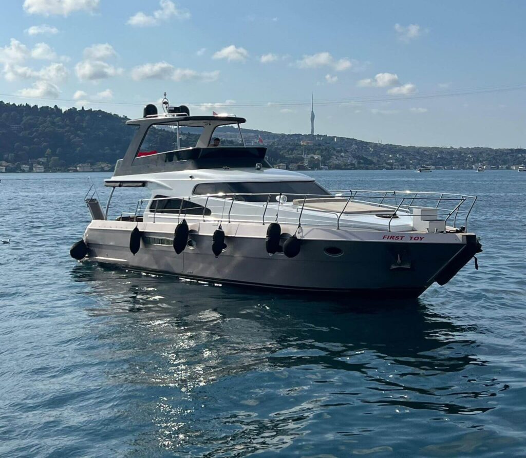 Overhead view of the P114 motor yacht moored along the Bosphorus shoreline in Istanbul.